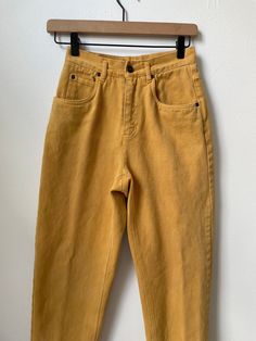 "My prices are firm, thanks for understanding! Cute 90s era Lizwear high rise jeans with a zipper fly and tapered leg in a nice mustard yellow color.  Fabric is 100% cotton, medium thickness, has a brushed feel that feels softer than average denim.  In good vintage condition with light overall wear as shown, some minor fading overall, and a few marks on the back left side near the upper thigh - zoom in 9th photo.  Tagged a size petite 4 however please review measurements taken laying flat to ensure desired fit: Just over 11\" across waist, 12\" pulled taut/max 18\" across hips, measured across base of fly 11\" front rise 27\" inseam 5.5\" width across each leg opening Colors may vary slightly.  Measurements are approximate and may vary slightly depending on how flat an item is laid. Feel f Mustard Color Outfits, Mustard Jeans Outfit, Acedamia Outfits, Yellow Jeans Outfit, Mustard Jeans, Mustard Yellow Outfit, Mustard Yellow Pants, Mustard Pants, Soft Autumn Color Palette