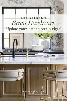 a kitchen with marble counter tops and gold bar stools in front of the sink