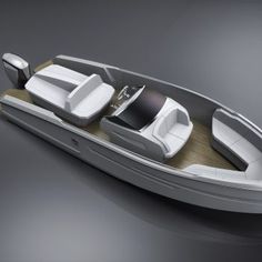 the interior of a small boat with two seats on it's back end and an open cockpit area