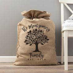 a burlock bag with the family tree on it sitting next to a chair