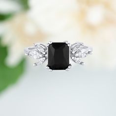 This gorgeous, timeless ring features our favorite black onyx design and hand picked crystals. ✦ DETAILS ✦ ✧ Handcrafted ✧ 2.0 Carat center stone ✧ Black onyx and cz crystals ✧ Sizes 3.75-11.25 ✧ Sterling Silver 925 ✧ This ring will arrive ready to gift in a Kherish Jewelry Pouch. ✧ PRE-ORDER: Items that are preorder only will ship within 10-15 business days. You will receive an email with the updated processing time if you order a size/option that qualifies for pre-order. ✧ Due to the nature of Black Cubic Zirconia Jewelry With Polished Finish, White Gold Onyx Ring For Anniversary, Silver Black Spinel Promise Ring, Silver Black Spinel Jewelry For Promise Ring, Classic Black Spinel Ring For Anniversary, Classic Black Spinel Jewelry With Polished Finish, Silver Onyx Ring Fine Jewelry, Fine Jewelry White Gold Onyx Rings, Fine Jewelry Onyx Silver Ring