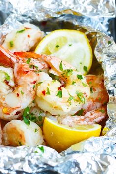 shrimp with lemon and parsley in aluminum foil