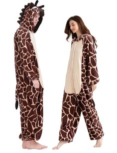 two people in giraffe onesuits standing next to each other