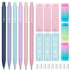 four different colored pens, one is blue and the other is pink