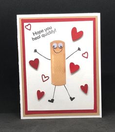 a card with a hot dog and hearts on it