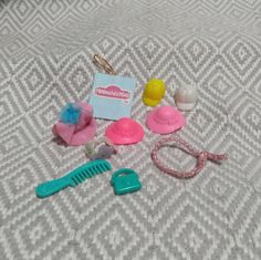 Good condition vintage mini dollhouse sized lot of Melanie's Mall accessories.  Includes: pink floppy hat with blue flower, bright pink sun hat, light pink sun hat, yellow baseball hat, white baseball hat, pink rope belt, floral headband, comb and mini purse. Playful Pink Mini Hats For Gifts, Playful Pink Mini Hat Gift, White Baseball Hat, Mini Dollhouse, Hat Light, Rope Belt, Floral Headband, Flagstaff, Floral Headbands