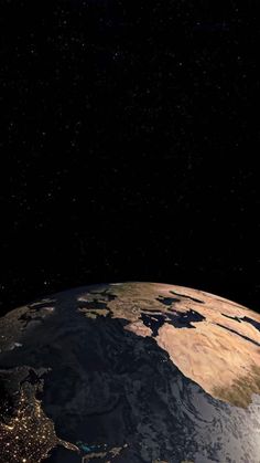 the earth at night with stars in the sky