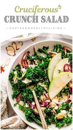 a white bowl filled with salad and apples