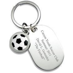 a key chain with a soccer ball on it and the words, congratulations for someone special