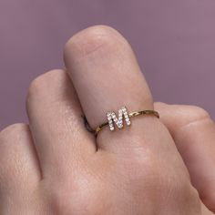 Add a little bling to your casual outfits by wearing this Pavé Crystal Monogram Ring. Crystals line the letter to create a beautiful sparkle. A trendy take on a classic style. Present this ring as a personalized gift! Ring Size: 6, 7 & 8 Color: Gold Band : 1 mm Letter : 4*6 mm Material: 14k gold plated on brass with clear coating on top for additional durability. Gemstone: Cubic Zirconia 16mm diameter- size 617mm diameter- size 718mm diameter- size 8 Adjustable Monogram Initial Ring For Everyday, Alphabet Rings Gold, Personalised Gifts Handmade, Christmas Gifts For Girlfriend, Letter Ring, Hammered Band, Monogram Ring, Personalized Bridesmaid Gifts, Initial Ring