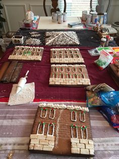 several gingerbreads are arranged on a table