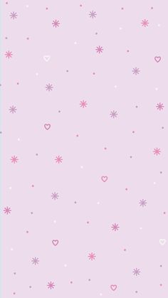 a pink wallpaper with hearts and stars on the bottom right hand corner is shown