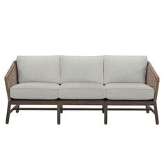 an outdoor sofa with grey cushions and wicker frame, viewed from the front view