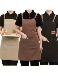 three people wearing aprons and holding food