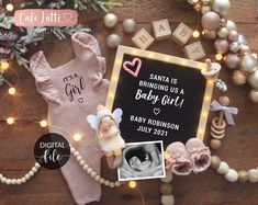 a baby's birth announcement surrounded by christmas ornaments and decorations, including an ornament