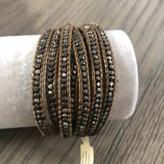 New Authentic Chan Luu Gunmetal Nugget Multi Strand Single Wrap Bracelet On Kansa Leather Stone: Gunmetal Nuggets All Chan Luu Items Are Guaranteed 100% Authentic!! Be Sure To Add Me To Your Favorites List! Elegant Metal Wrap Bracelet, Silver Metal Wrap Bracelet For Party, Adjustable Brown Metal Wrap Bracelet, Elegant Black Metal Wrap Bracelet, Brown Metal Beaded Bracelets, Adjustable Brown Wrap Bracelet For Party, Adjustable Metal Wrap Bracelet For Party, Gold Beaded Metal Wrap Bracelet, Gold Metal Wrap Bracelet For Party