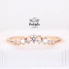 three stone diamond ring in rose gold setting