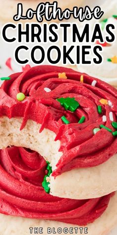 christmas cookies with red frosting and sprinkles