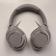 the headphones have been placed on top of each other