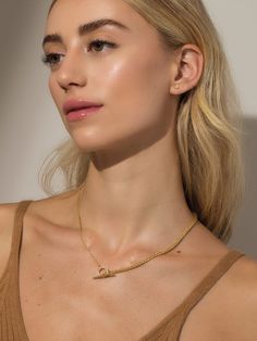 A dainty chain and a thick chain meet in the middle with a pavé circle closure and a large toggle bar to create our Turn It up Chain Necklace. This gold chain necklace is the perfect everyday style that can be layered with simple or bold necklaces — it’s all up to you. | Turn It Up Chain Necklace GOLD Timeless Everyday Clavicle Chain Necklace, Modern Chunky Chain Toggle Necklace, Chic Jewelry With Toggle Clasp And Link Shape, Timeless Toggle Necklace With Adjustable Chain, Minimalist Chain Necklace With Toggle Clasp, Elegant Lariat Chain Necklace With Toggle Clasp, Minimalist Toggle Necklace With Chunky Chain For Everyday, Everyday Toggle Link Chain Necklace, Everyday Toggle Link Necklace