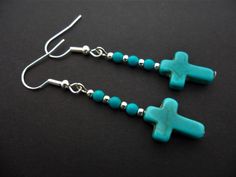 This a pair of pretty little  tibetan silver dangly cross earrings. Measure approx. 5cm from top of hook to bottom of earring. Freshly made by me and unworn. Thanks for looking!! Adjustable Turquoise Cross Jewelry, Nickel Free Adjustable Cross Earrings, Handmade Turquoise Cross Jewelry, Bead Cross, Turquoise Cross, Cross Earrings, Dangly Earrings, Silver Turquoise, Tibet