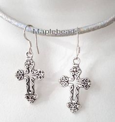 "-Materials : silver tone metal, nickel and lead free -size: 1\" length, 25mmX15mm cross charms -sterling silver hooks" Hypoallergenic Cross Earrings, Cross Shaped Metal Earrings For Pierced Ears, Nickel-free Metal Cross Pendant Jewelry, Silver Hoop Earrings With French Hook, Nickel Free Adjustable Cross Earrings, Silver Cross Metal Jewelry, Nickel-free Metal Cross Jewelry, Silver Dangle Hoop Earrings With French Hook, Silver Sterling Hoop Earrings With French Hook