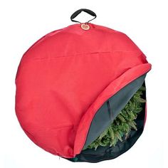 a red and black bag filled with christmas trees