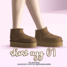 a pair of brown shoes with the words short ugg 101 on it's bottom