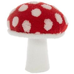 a red and white mushroom with polka dots on it's cap is shown in front of a white background