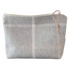 CANADA : TAXE INCLUDED  CANADA : TAXE INCLUSES   Enjoy this very unique makeup bag! This neutral cosmetic bag will be your favorite minimalist pouch to carry your little needs: lip balm, beauty products, nails, hair accessories, intimate products etc... you will love it. It's carefully made in a designer fabric called Olefin, resistant upholstery type fabric. perfect gift for women... .  This is:  Greyline . Fabric:  FRONT : OLEFIN                   BACK:  solid organic cotton canva . Natural co Everyday Cream Zipper Pouch, Gray Pouch Bag With Zipper, Beige Zipper Pouch Cosmetic Bag, Gray Zipper Pouch Bag, Gray Everyday Bag With Zipper Pouch, Beige Rectangular Zipper Pouch, Beige Pouch For Daily Use, Daily Use Beige Pouch, Gray Pouch Bag For Gift