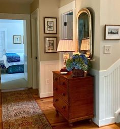 the hallway is clean and ready for us to use as an entrance way in this home