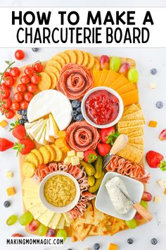 a platter with cheese, crackers and fruit on it is featured in the article how to make a charcuterie board