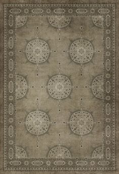 an area rug with many different shapes and sizes on the carpet, including circles in grey tones