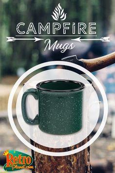 a campfire mug sitting on top of a tree stump with the words campfire mugs over it