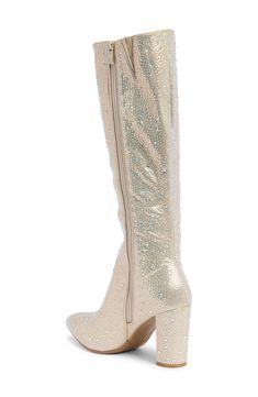 Glistening rhinestones shimmer like a disco ball under dance floor lights in these tall party-perfect boots finished with a covered heel and pointed toe. 3 2/3" heel 15" shaft Full side zip closure Synthetic upper, lining and sole Imported Glamorous Sequined Party Boots, Sparkling High Heel Holiday Boots, Glamorous Pointed Toe Knee-high Boots For Party, Glamorous Boots With Round Toe For Party Season, Glamorous Knee-high Boots With Pointed Toe For Party, Glamorous Holiday Boots With Round Toe, Glamorous Party Knee-high Boots With Pointed Toe, Glamorous Round Toe Boots For Party Season, Glamorous Round Toe Boots For Parties