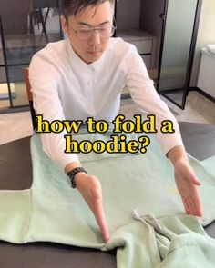 Sweatshirt lazy fold method 😍✨Tag and share with your friends 💞 Boxe organizer link in bio 🛍️⬆️ FOLLOW @myorganizinginterior FOR MORE… | Instagram How To Fold Your Hoodie, Folding Clothes Hoodie, How To Fold Hoodies For Travel, How To Fold Sweatshirts For Travel, Best Way To Fold Sweatshirts, How To Fold A Hoodie Into A Pillow, How To Fold A Hoody, Fold A Hoodie How To