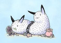 two white stuffed animals sitting next to each other on a blue background with pink flowers