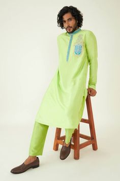 Vibrant green kurta with color block placement embroidered motif. Comes with vibrant green tonal pant. - Aza Fashions Green Straight Kurta With Resham Embroidery, Designer Green Kurta With Embroidered Border, Green Traditional Straight Kurta With Embroidered Border, Green Straight Kurta With Embroidered Border, Green Straight Kurta Set With Embroidered Border, Designer Green Embroidered Kurta, Green Straight Kurta With Floral Embroidery, Green Embroidered Straight Kurta, Fitted Green Embroidered Kurta