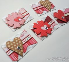 four valentine's day cards with hearts, flowers and bows on them are shown