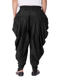 Vastramay brings to you this Stylish yet Comfortable Men Black Men Cotton Art Silk Cowl Design Patiala Style Dhoti Pant. Adorn it for a perfect Classy and Trendy look. Pair it with a juti or a mojari for the Royal look. Product Features : Top Color: Black Bottom Color: Black Top Fabric: Cotton Art Silk Bottom Fabric: Cotton Art Silk Blend Product Type: Cowl Design Patiala Style Dhoti Pant Fabric Purity: Blended Weave Pattern: Regular Disclaimer: There will be slight difference in digital to actu Traditional Fitted Harem Pants, Traditional Cotton Pants With Drape, Bollywood Style Cotton Pants For Eid, Fitted Bollywood Bottoms For Navratri, Traditional Festive Cotton Harem Pants, Bollywood Style Cotton Bottoms For Navratri, Fitted Bottoms With Traditional Drape For Navratri, Festive Cotton Harem Bottoms, Bollywood Style Cotton Pants For Diwali