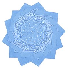 six blue napkins with an intricate design on the front and center, all folded together