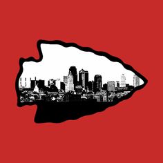 a black and white silhouette of a city on a red background