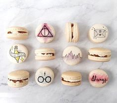 harry potter macaroons are arranged on a marble surface