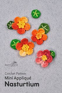 crochet pattern for mini applique flowers in multicolors on grey background