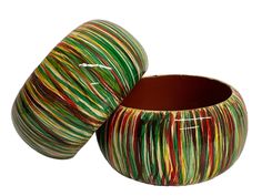 Add a pop of colour and style to your outfit with this wide chunky hand-painted ethnic wooden bangle bracelet. Made with love and care, this handmade piece features a round shape and a vibrant orange colour that will surely catch anyone's attention. Perfect for casual wear or for adding an ethnic touch to any special occasion. This bangle embodies a unique style. Length: 7cm Inner Dimensions:20cm Width: 5cm Weight:30g Colour: Multicolour Material: Wooden (One bangle Supply) Hand Painted Multicolor Bangle, Multicolor Hand Painted Bangle, Wooden Bangle Bracelet, Wooden Bangle, Large Bracelet, Orange Colour, Vibrant Orange, Bangle Bracelet, Round Shape