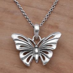 A beautiful shining butterfly spreads its wings in this pendant necklace crafted of combination finish sterling silver by Balinese artisans. Yuniati designs this brilliant necklace centering the pendant on a length of cable chain. Unique Silver Butterfly Pendant Necklace, Unique Sterling Silver Butterfly Necklace, Unique Silver Butterfly Necklace, Silver Butterfly Pendant Necklace As A Gift, Silver Butterfly Pendant Necklace Gift, Silver Butterfly Pendant Necklace For Gift, Spiritual Silver Butterfly Necklace, Unique Silver Butterfly Necklace For Gift, Spiritual Silver Jewelry With Butterfly Charm