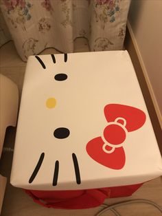 a hello kitty box sitting on top of a table