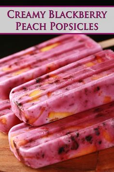 three popsicles are stacked on top of each other with the words, creamy blackberry peach popsicles