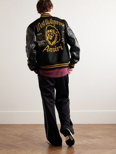 AMIRI's wool-blend varsity jacket commemorates the graduating class of 2024 from its fictitious theatre academy. Appliquéd and embroidered with signature motifs, it has supple full-grain leather sleeves and ribbed, striped trims. Leather Varsity Jackets, Leather Sleeves, Class Of 2024, Coach Jacket, Jacket For Men, Leather Sleeve, Loungewear Shorts, Short Suit, Mr Porter