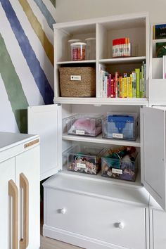 an organized pantry in a child's playroom